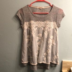 Women’s grey shirt with lace over lay